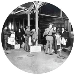 Officers perform screening on civilians.